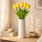 yellow artificial tulips in vase