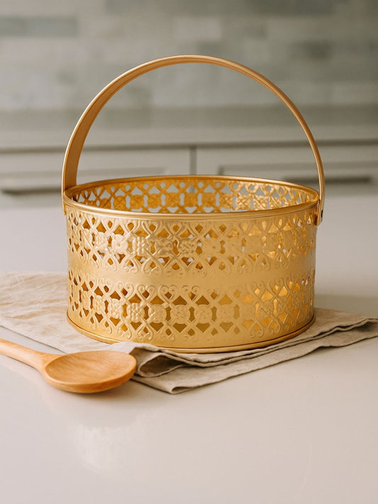 Decorative gold basket with intricate patterns 