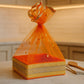 Hanging Orange Diwali Gift Basket Tray with Sheer Net Cover and Gold Embroidery