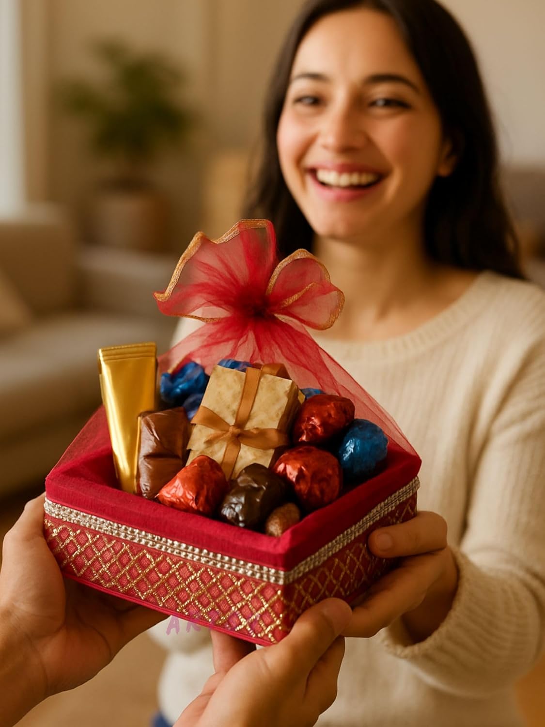 maroon festive gift basket with chocolates and decorative net cover