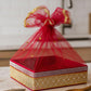reusable festive gift hamper basket with fabric embellishments and net cover