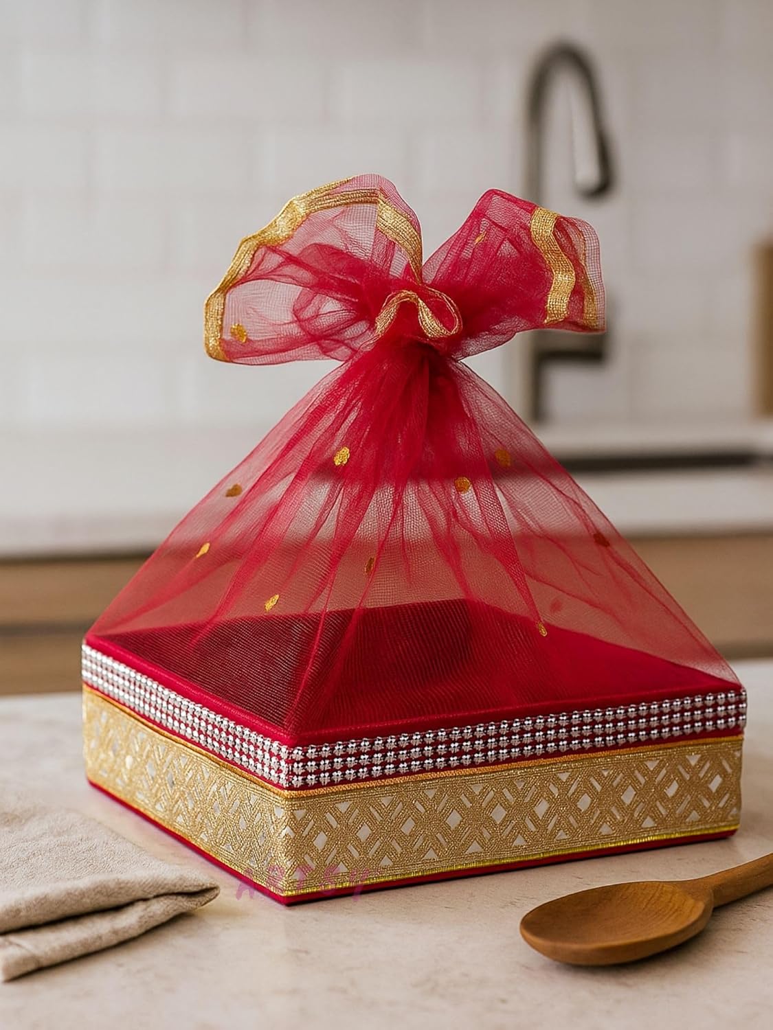 reusable festive gift hamper basket with fabric embellishments and net cover